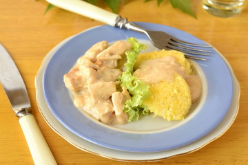 Chicken in a cream sauce with polenta