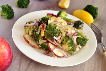 Broccoli with apple, red onion and walnuts