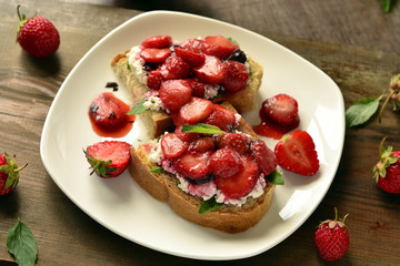 Sandwich with strawberries, cheese and chocolate