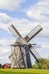 Fototapeta na wymiar Windmill in a rural setting