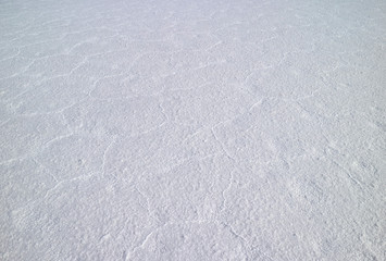 The unique pattern of the surface of Salar de Uyuni Salt Flats, UNESCO World Heritage site in Bolivia, South America 