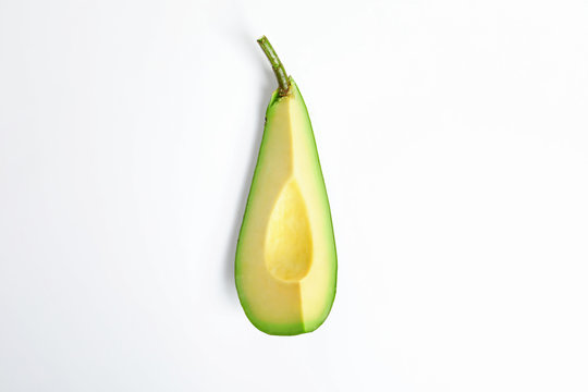 Slice of avocado on white background