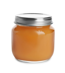 Jar with healthy baby food on white background
