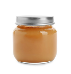 Jar with healthy baby food on white background