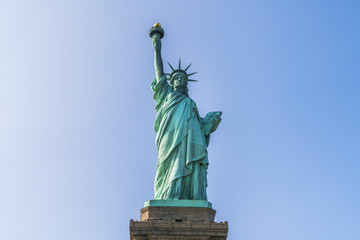 Fototapeta premium The statue of Liberty with blue sky background.