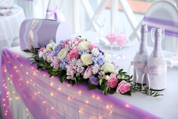 Wedding table for newlyweds with flowers