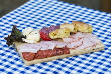 refection hors d'oeuvre. mix of meat meal. Sliced cheese, ham, sausage, cheese pie.