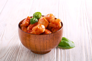 Chicken breast pieces in tomato sauce