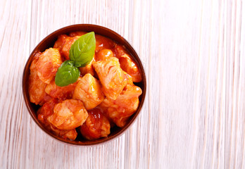 Chicken breast pieces in tomato sauce