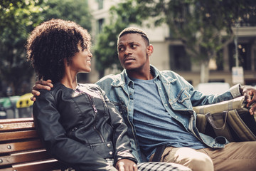 Young happy black couple outdoors