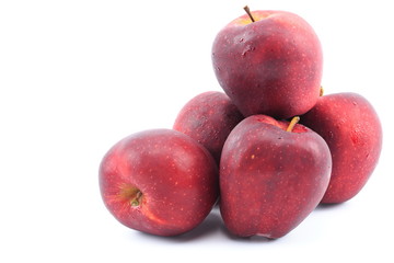 Red apples on a white background.