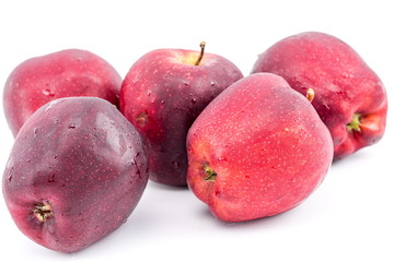Red apples on a white background.