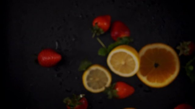 Fresh fruits frozen in mid-air. Shooted in super slow motion