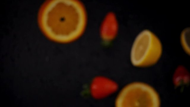 Fresh fruits frozen in mid-air. Shooted in super slow motion