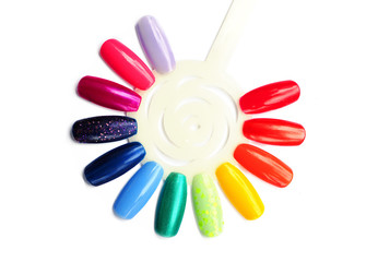 Rainbow nail polish samples close up, colorful nail polish in rainbow colors and glitter; nail...