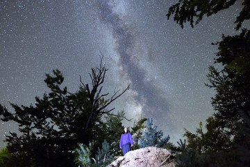 Young woman Milky Way night sky