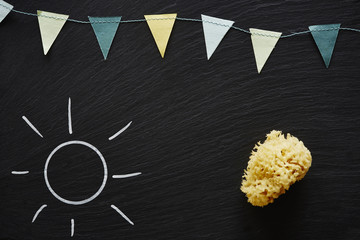 drawing a sun on blackboard first day of school