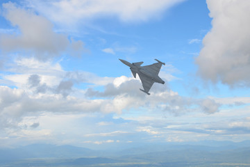 Gripen aircraft over the horizon.