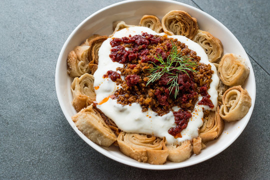 Turkish Manti with Yogurt, Minced Meat and Fried Butter Sauce From Artvin called Silor / Siron / Ziron Rolled Raw Dough and Fried Phyllo / Manlama