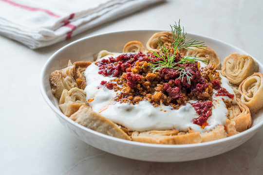 Turkish Manti with Yogurt, Minced Meat and Fried Butter Sauce From Artvin called Silor / Siron / Ziron Rolled Raw Dough and Fried Phyllo / Manlama
