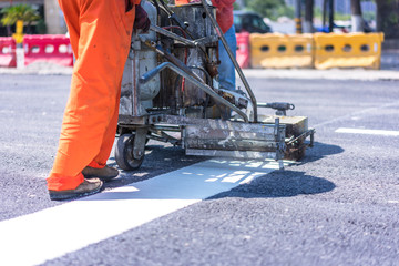 worker working in asphalt raod construction