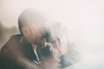 cameraman shoots a movie camera on a trip.