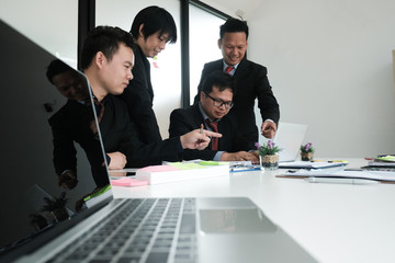 business adviser analyzing company financial report. professional investor discussing idea....