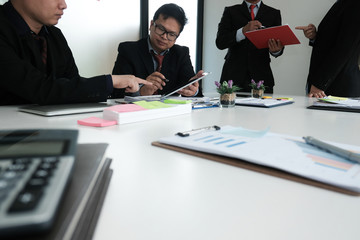 business adviser analyzing company financial report. professional investor discussing idea....