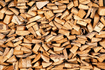 Firewood for heating the house in the winter period under the house.