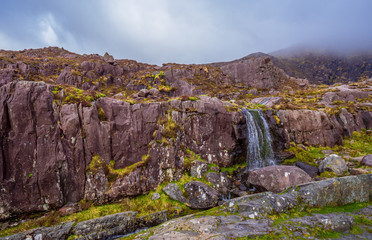 The Connor Pass Waterfall - popular landmark on Dingle Peninsula Ireland