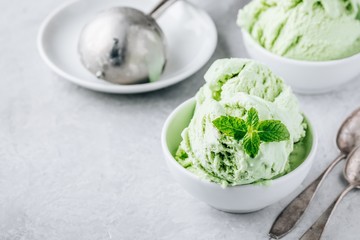 Homemade green lime Ice Cream with mint leaves