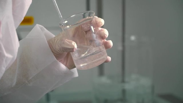 Process of mixing viscous liquid in a flask, laboratory