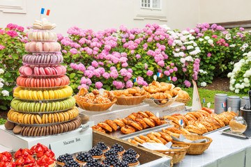Variation of sweet pastry, pastry fruit bowls with blue berries, strawberries, raspberries, box...