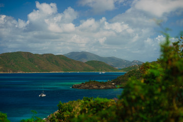 Fototapeta na wymiar Beautiful bay in island with green hills and yachts, St. John US Virgin Islands