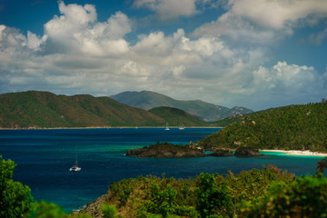 Fototapeta na wymiar Beautiful bay in island with green hills and yachts, St. John US Virgin Islands