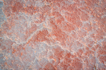 The texture of a dried salt pink lake in Torrevieja in Spain