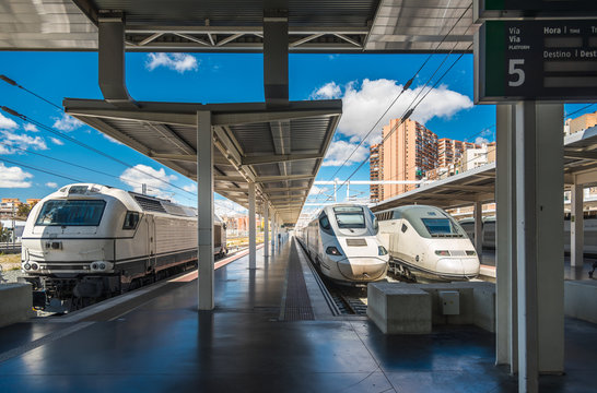 Fototapeta Modern high speed train on railway station in Madrid