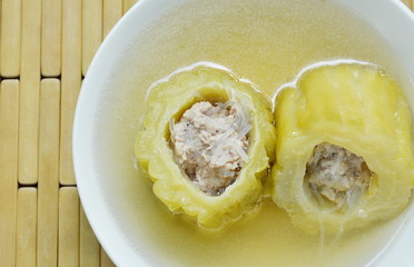 boiled bitter melon stuffed minced pork and glass noodles soup on bowl