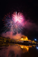 Fireworks celebrate the New Year 2018 at Rajapruek Royal Park, Chiang Mai with beutiful light of Hor Khum Luang temple,Thai Tradition Building