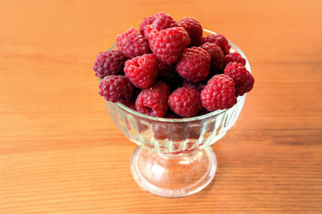 raspberries in a glass bowl