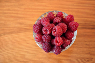 raspberries in a glass bowl