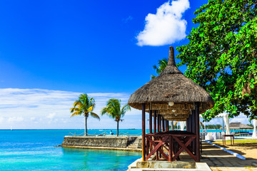 Fototapeta premium Luxury vacation in tropical resort. Mauritius island. Beachside restaurant