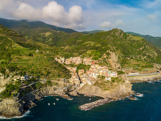 Obraz premium Manarola - Village of Cinque Terre National Park at Coast of Italy. Province of La Spezia, Liguria, in the north of Italy - Aerial View - Travel destination and attractions in Europe.