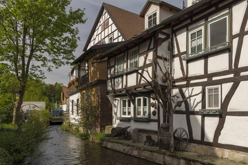 Fototapeta na wymiar House with typical German style close to a river
