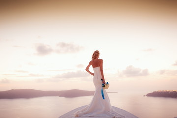 Fototapeta na wymiar Bride and Groom on Santorini