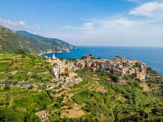 Obraz premium Corniglia - Village of Cinque Terre National Park at Coast of Italy. Province of La Spezia, Liguria, in the north of Italy - Aerial View - Travel destination and attractions in Europe.