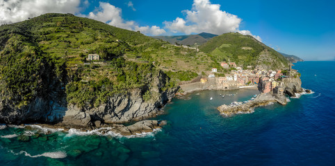 Vernazza - Village of Cinque Terre National Park at Coast of Italy. Province of La Spezia, Liguria, in the north of Italy - Aerial View - Travel destination and attractions in Europe.