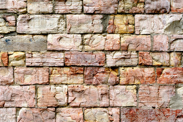Old weathered brick wall as background or texture