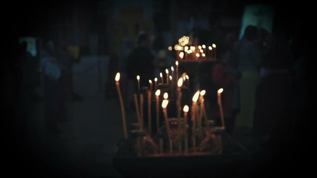 lighted candles in the church close-up