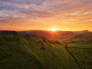 Fototapeta premium Chrome Hill seen from Parkhouse Hill in Peak District UK during Sunset